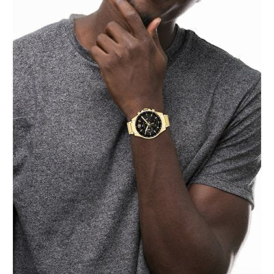 Tommy Hilfiger Max gold chronograph watch worn on wrist