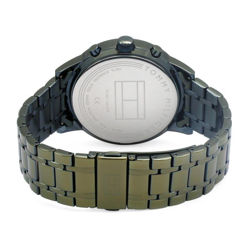 Close-up of Tommy Hilfiger watch dial showing three chronograph subdials, indices, and date window