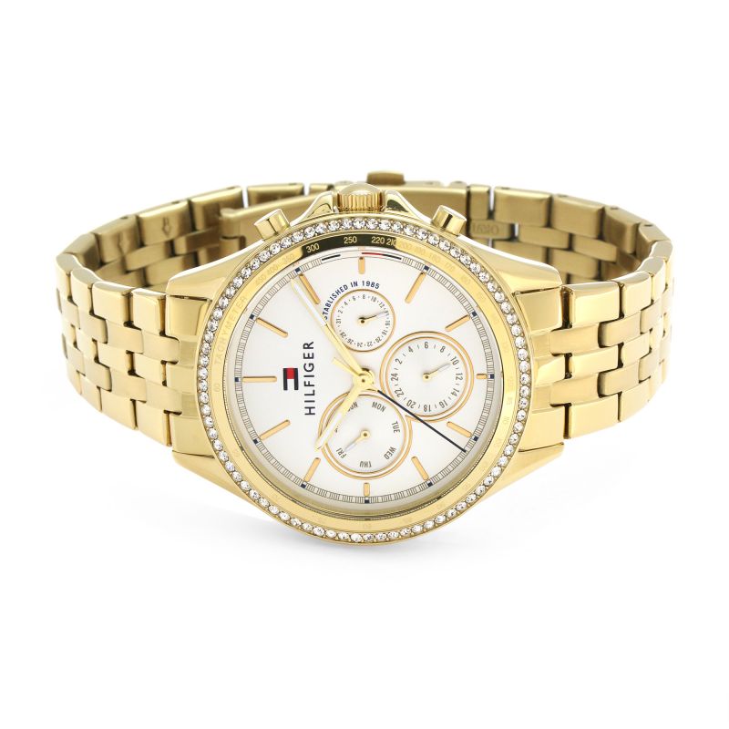 Tommy Hilfiger women's chronograph watch at 45-degree angle showing gold bracelet and multi-dial face