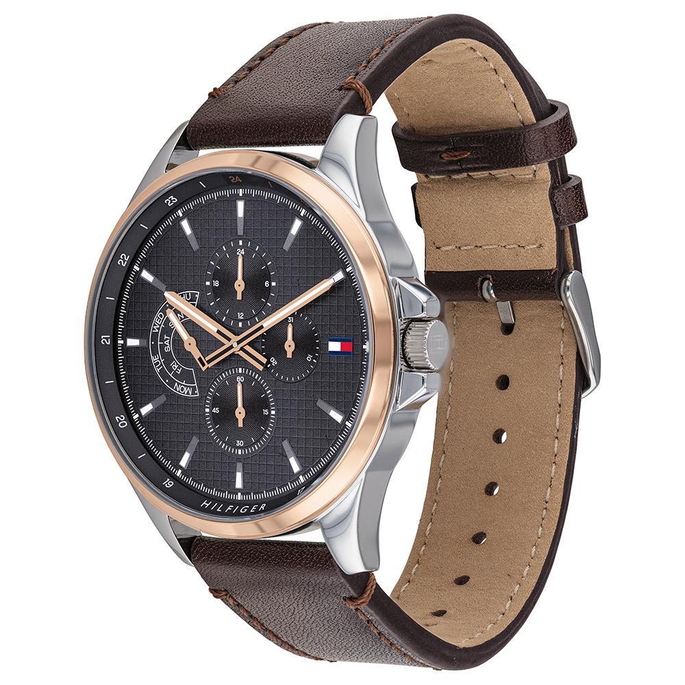Side view of Tommy Hilfiger multifunction watch showing brown leather strap with tan suede back
