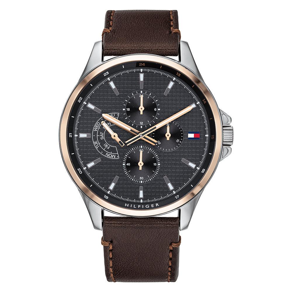 Tommy Hilfiger multifunction men's watch with brown leather strap, black dial, and chronograph subdials