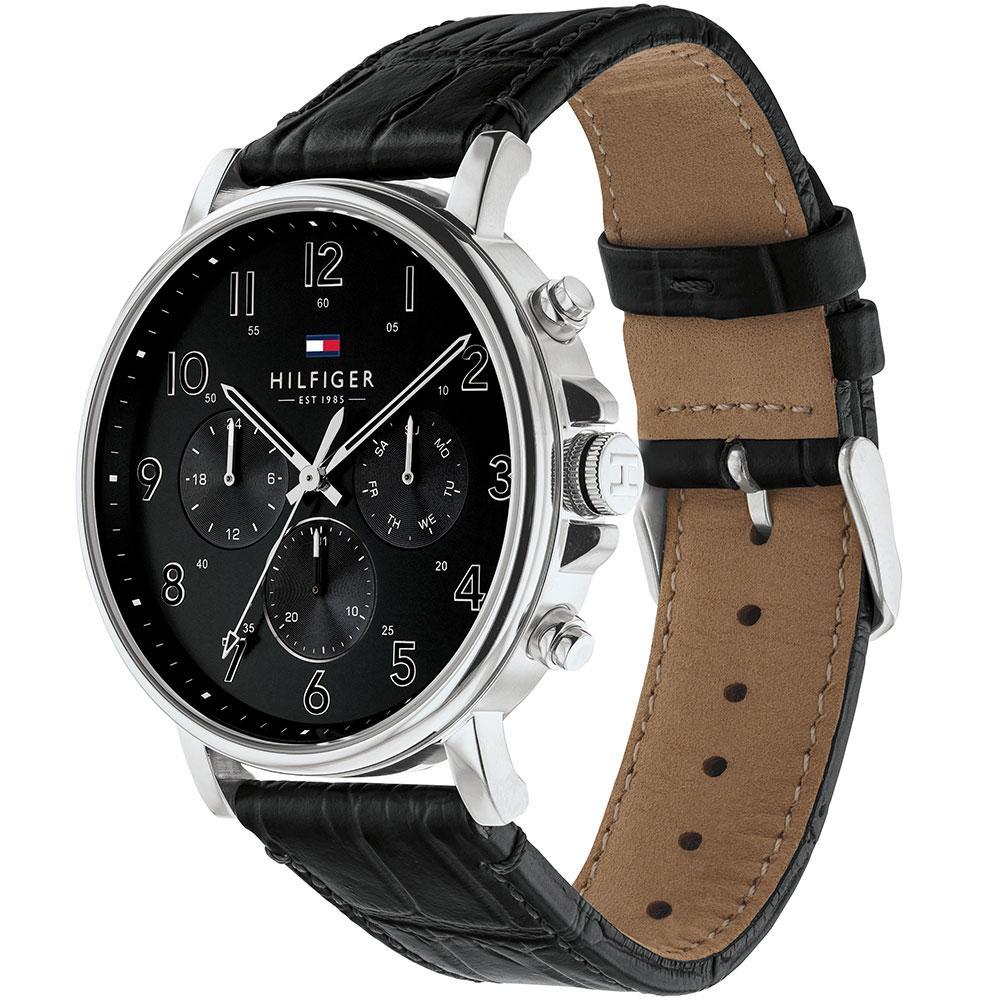 Side angle of Tommy Hilfiger chronograph watch showing black quilted leather strap with tan inner lining