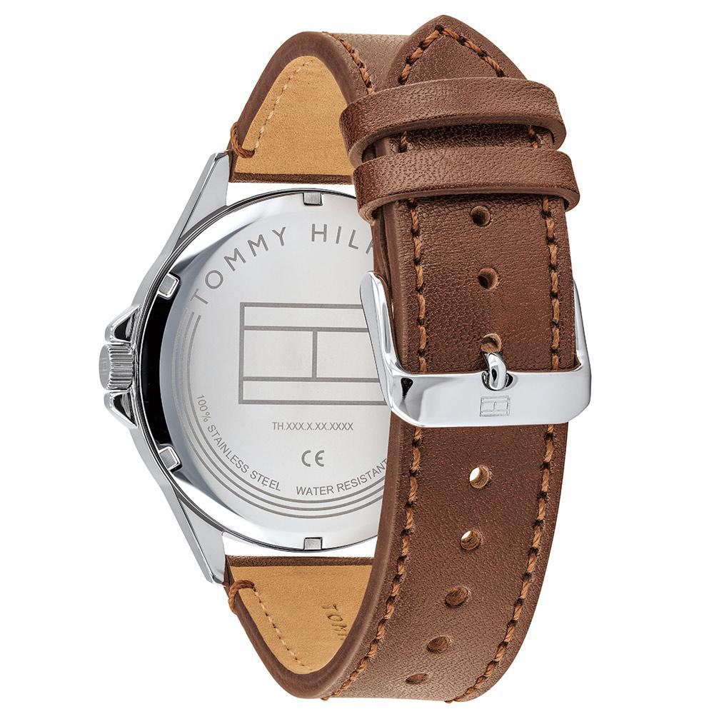 Caseback view of Tommy Hilfiger watch with brown leather strap and adjustment holes
