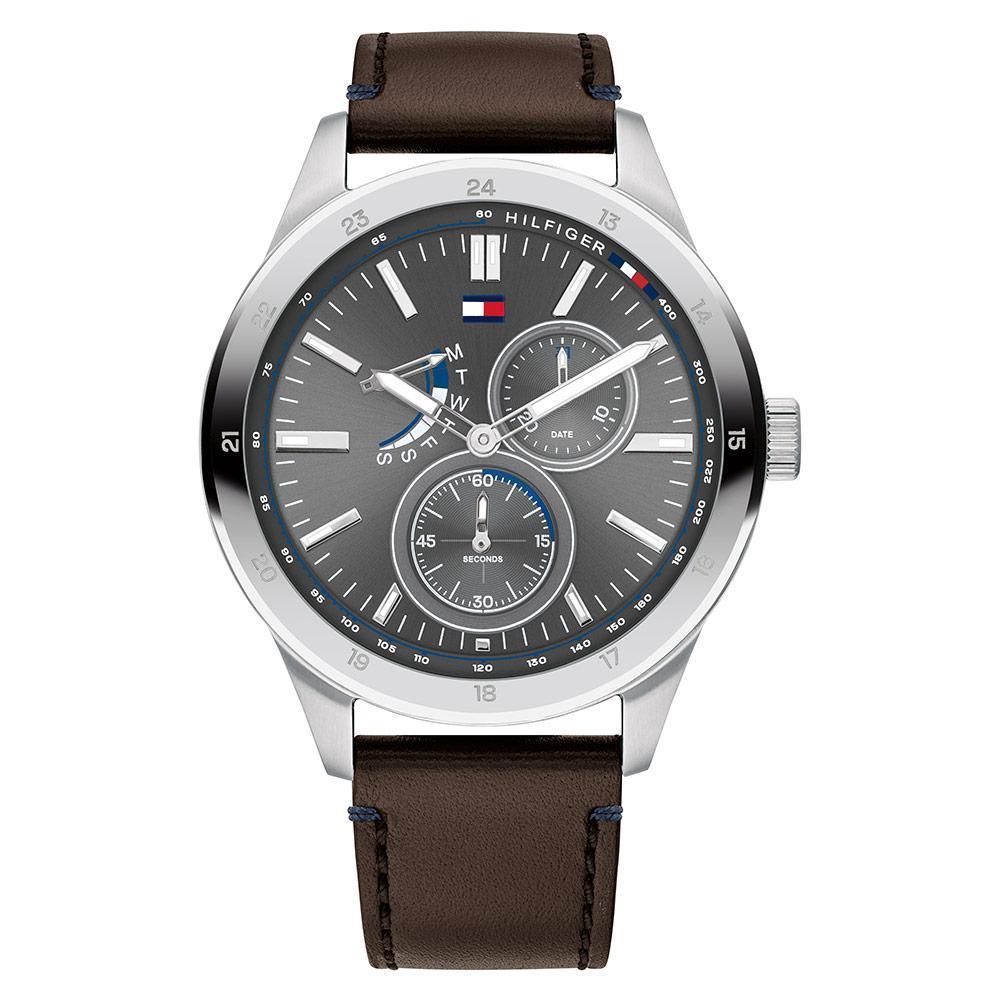 Tommy Hilfiger multifunction watch with gray dial, dual subdials, brown leather strap, and stainless steel case