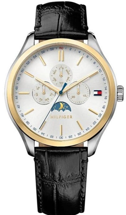 Tommy Hilfiger Oliver analog watch with silver dial, two-tone case, black leather strap, and moon phase display