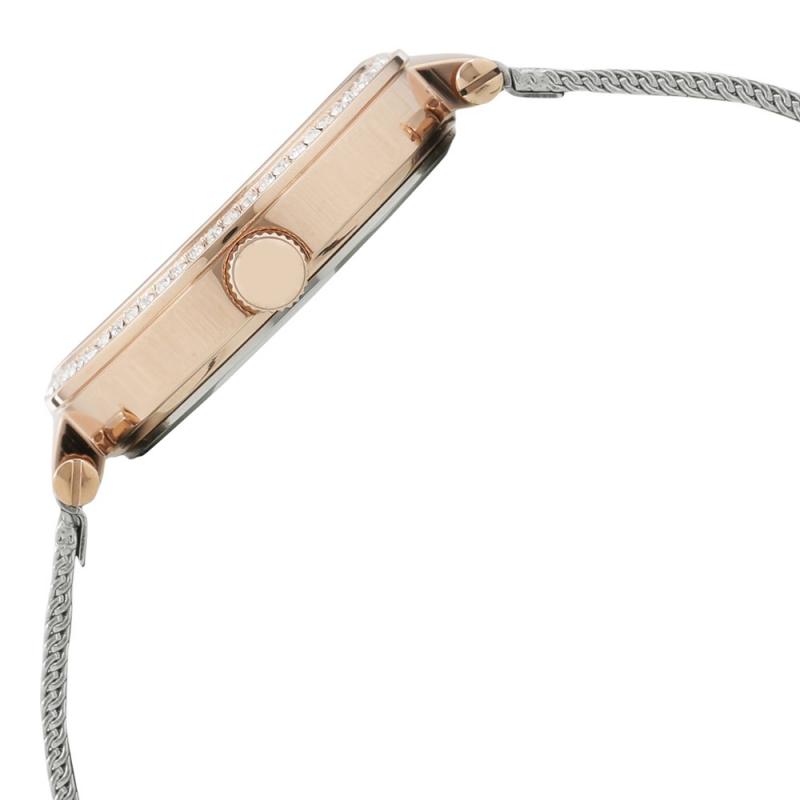 Side profile of Tommy Hilfiger Sport Lux watch case with rose gold finish and crystal details