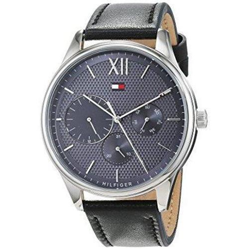 Three-quarter view of Tommy Hilfiger The Damon watch showing dial and black leather strap