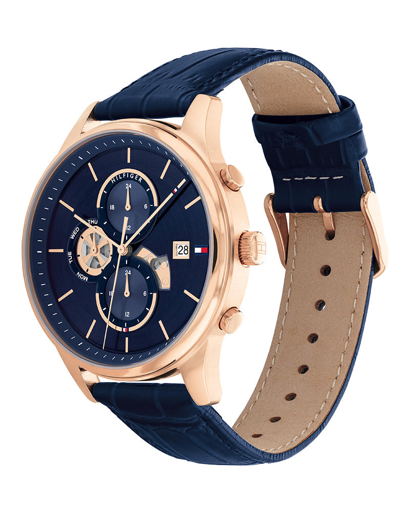 Side profile view of watch showing rose gold case and blue leather strap