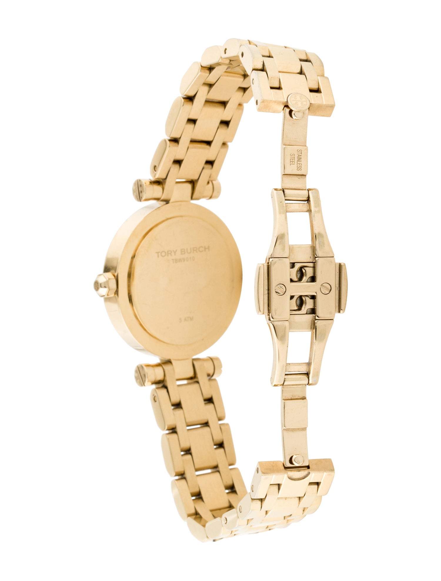 Tory Burch Classic T watch case back with engraved branding and gold metal construction