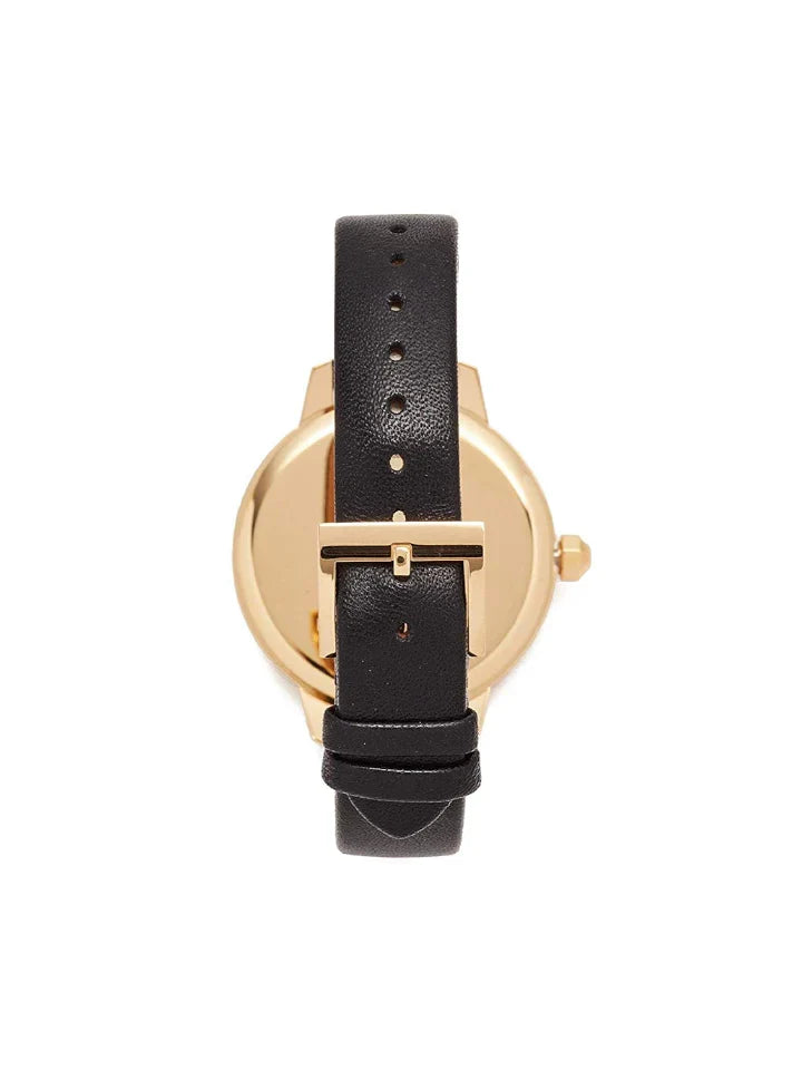 Back view of Tory Burch Collins watch showing caseback and black leather strap
