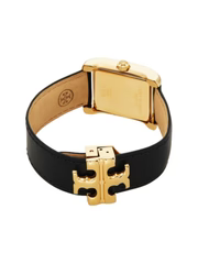 Angled view of Tory Burch Eleanor watch with white dial, gold case, and black leather strap with logo