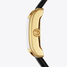 Side profile of Tory Burch Eleanor watch showing gold-tone case and black leather strap
