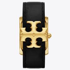 Tory Burch Eleanor watch strap detail showing black leather and gold-tone Tory Burch logo buckle