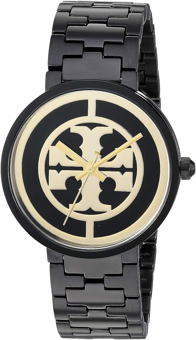 Angled view of Tory Burch Reva watch showing black case, gold Tory Burch logo dial, and black bracelet