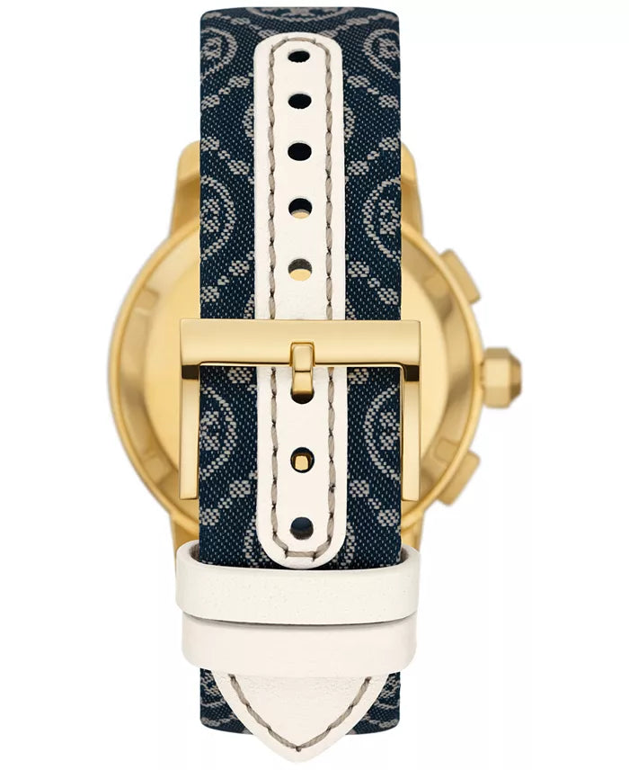 Watch caseback showing navy fabric and ivory leather strap attachment with gold-tone hardware and buckle