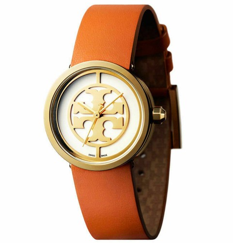 Tory Burch TBW4034 angled view showing gold case and orange leather strap