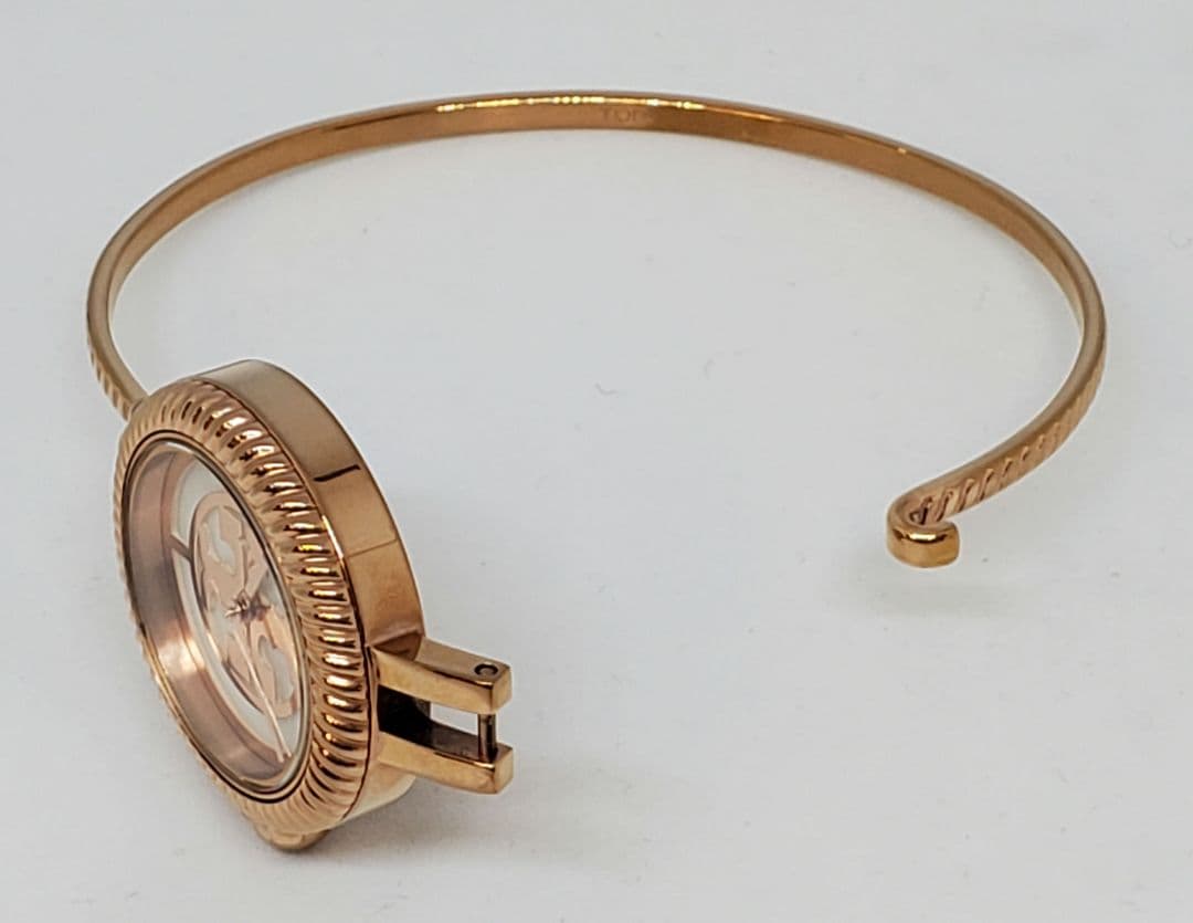 Tory Burch TBW4037 Riva rose gold bangle watch on wrist side view