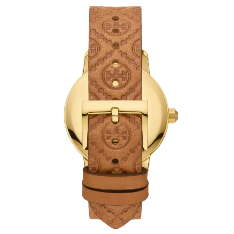 Caseback view of gold-tone watch with brown monogram leather strap and buckle closure
