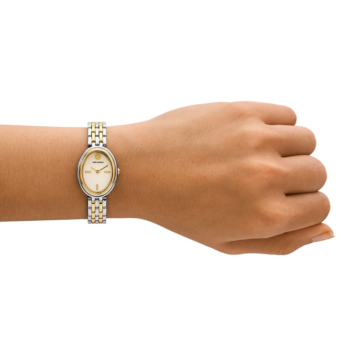 Tory Burch The Oval two-tone watch worn on wrist showing actual size and fit