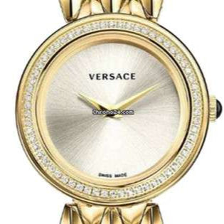 Close-up of Versace watch dial with crystal bezel and gold case