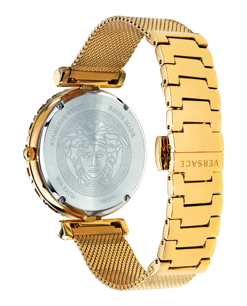 Side view of Versace Empire Greca gold watch with caseback visible and mixed strap design