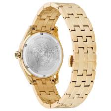 Versace Greca Time caseback showing silver medallion with Medusa logo and gold steel case