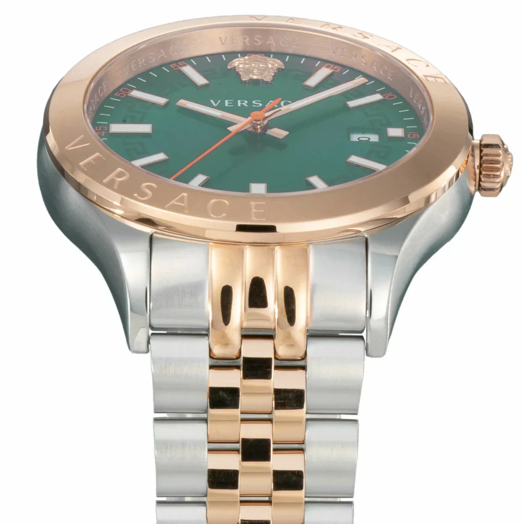 Close-up of Versace Hellenium dial showing green face with applied indices and rose gold crown