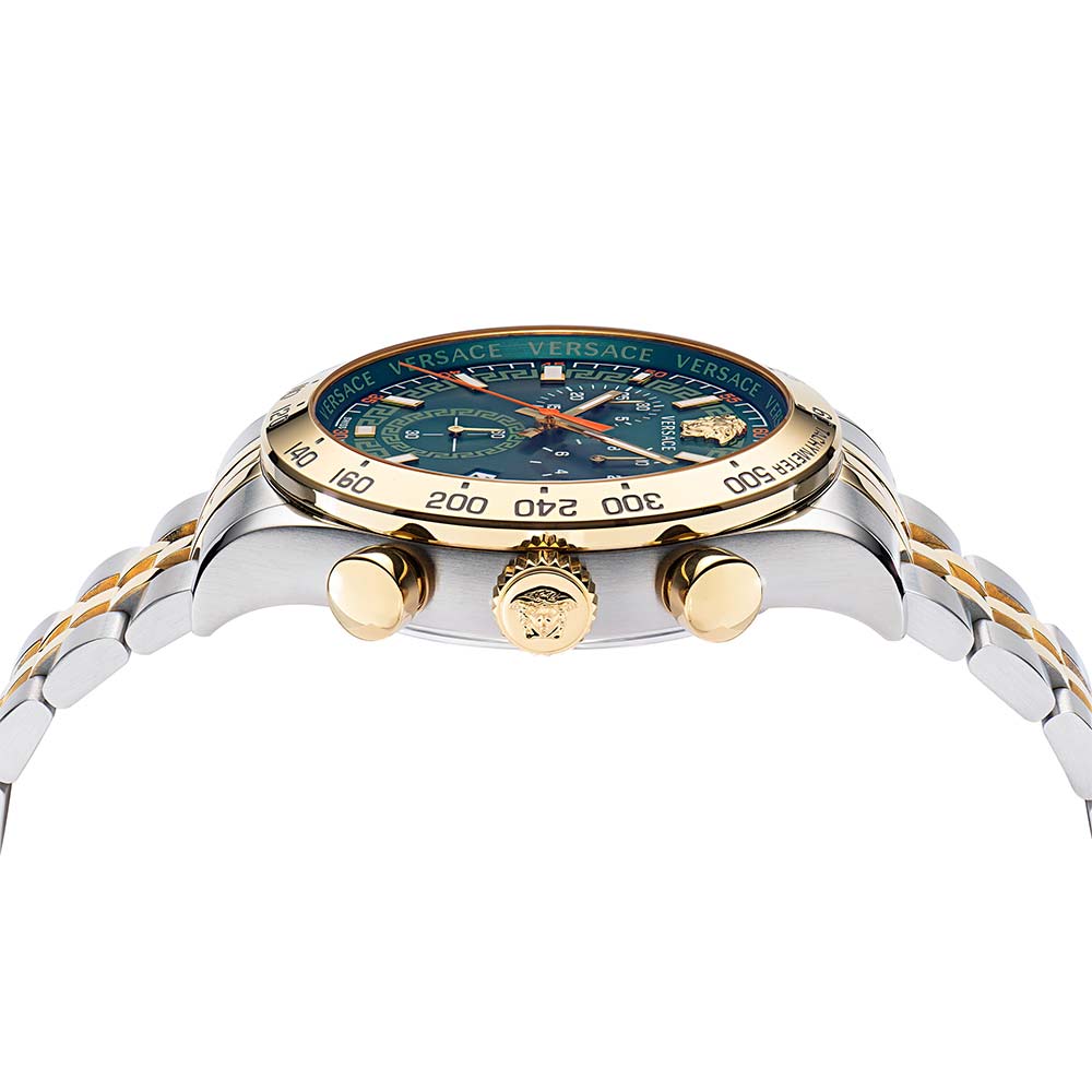 Side profile of Hellenyium chronograph displaying green dial, gold bezel, and two-tone bracelet with pushers