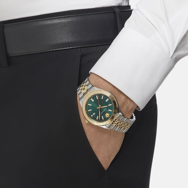 Versace Hellenyium watch worn on wrist with formal attire