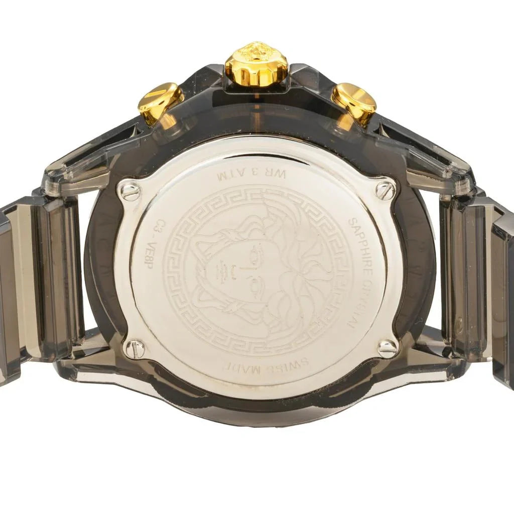 Watch caseback showing white dial with Medusa Gorgoneion profile, Greek key pattern and Versace engraving