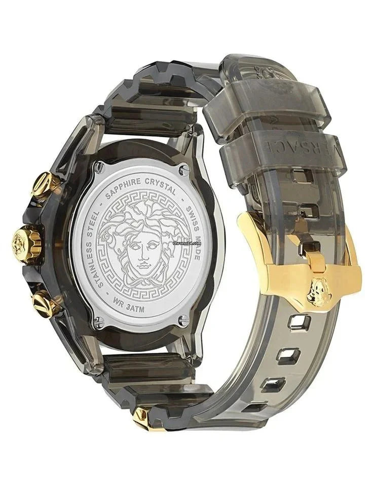Sapphire crystal caseback showing white dial with Medusa head and Versace branding on black rubber strap