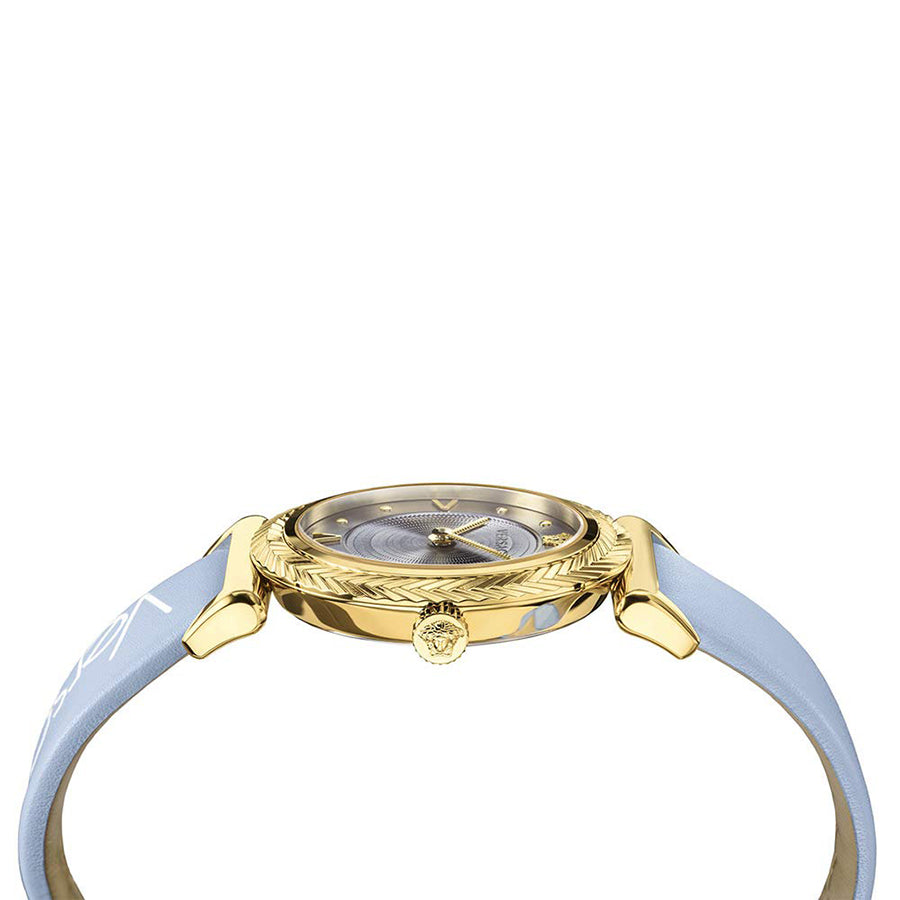 Angled view of Versace V-Motif watch displaying gold case, ornate bezel, and blue strap
