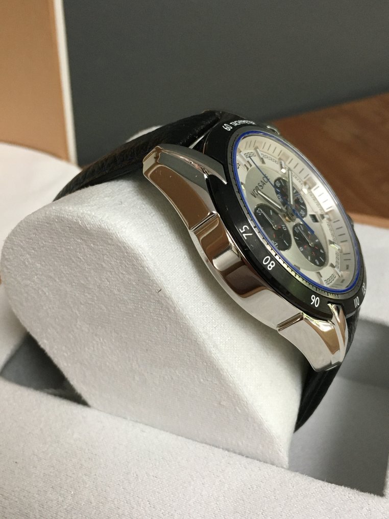 Versace V-Ray watch displayed at angle showing stainless steel case and black leather strap