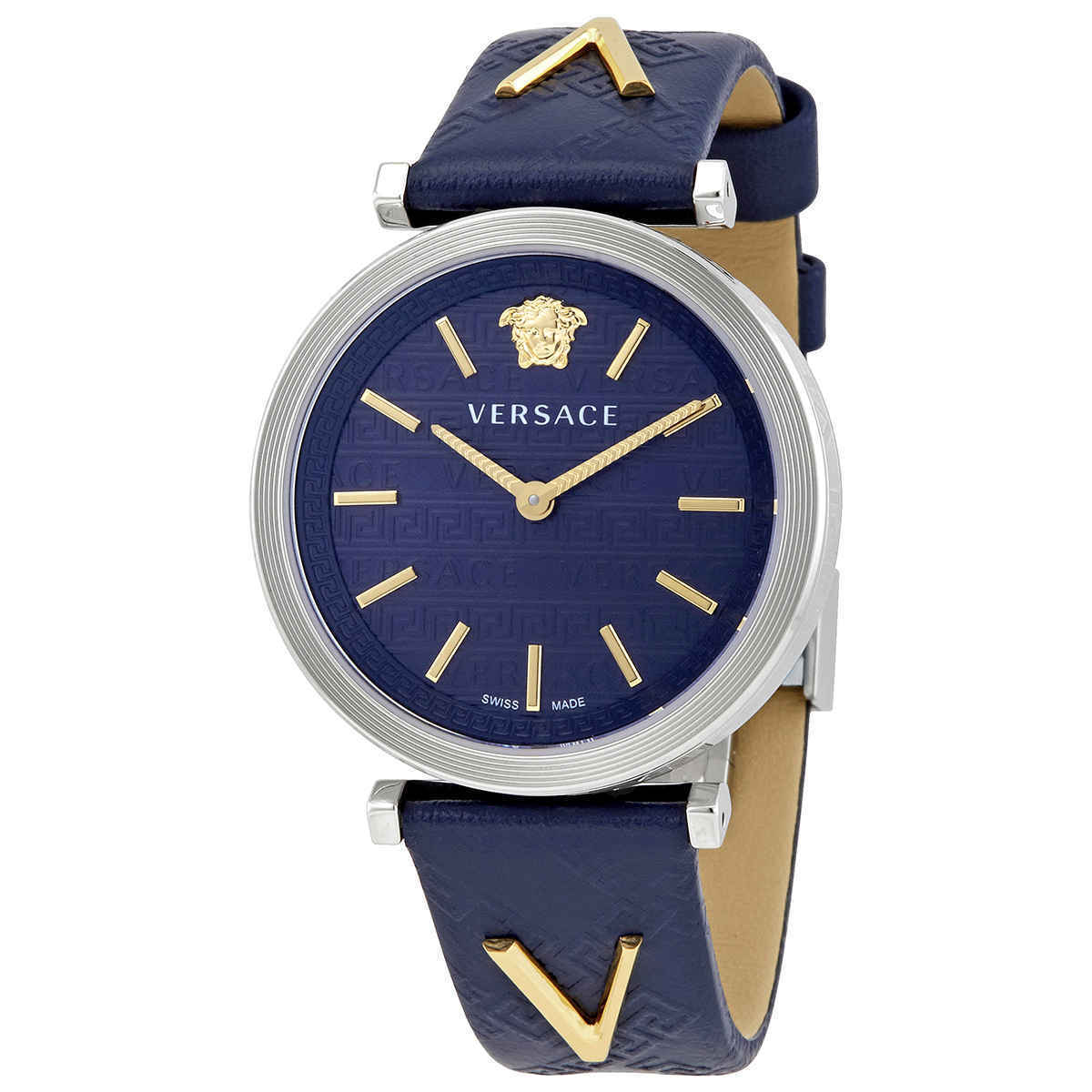 Versace V-Twist watch on wrist showing navy blue dial with gold-tone hour markers and Medusa logo