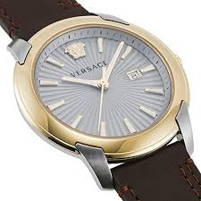Versace V-Urban 3H 42mm watch viewed from angle showing gold bezel and brown leather strap