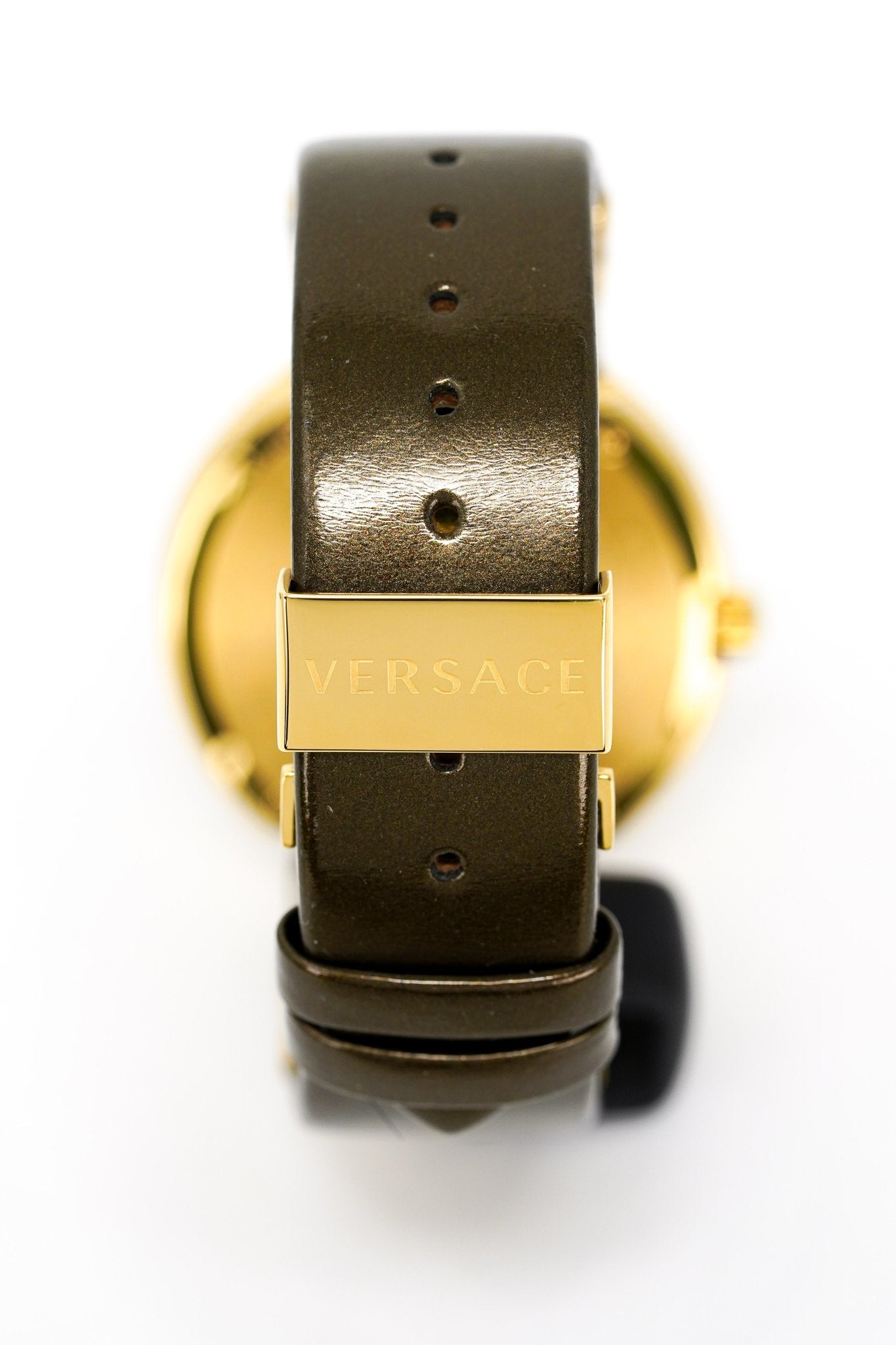 Side view of Versace watch showing rose-gold case, brown leather strap with gold buckle
