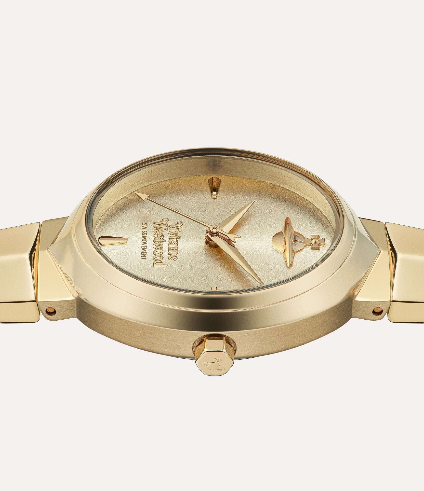 Close-up of Vivienne Westwood Armour gold dial with Orb logo and Swiss movement text