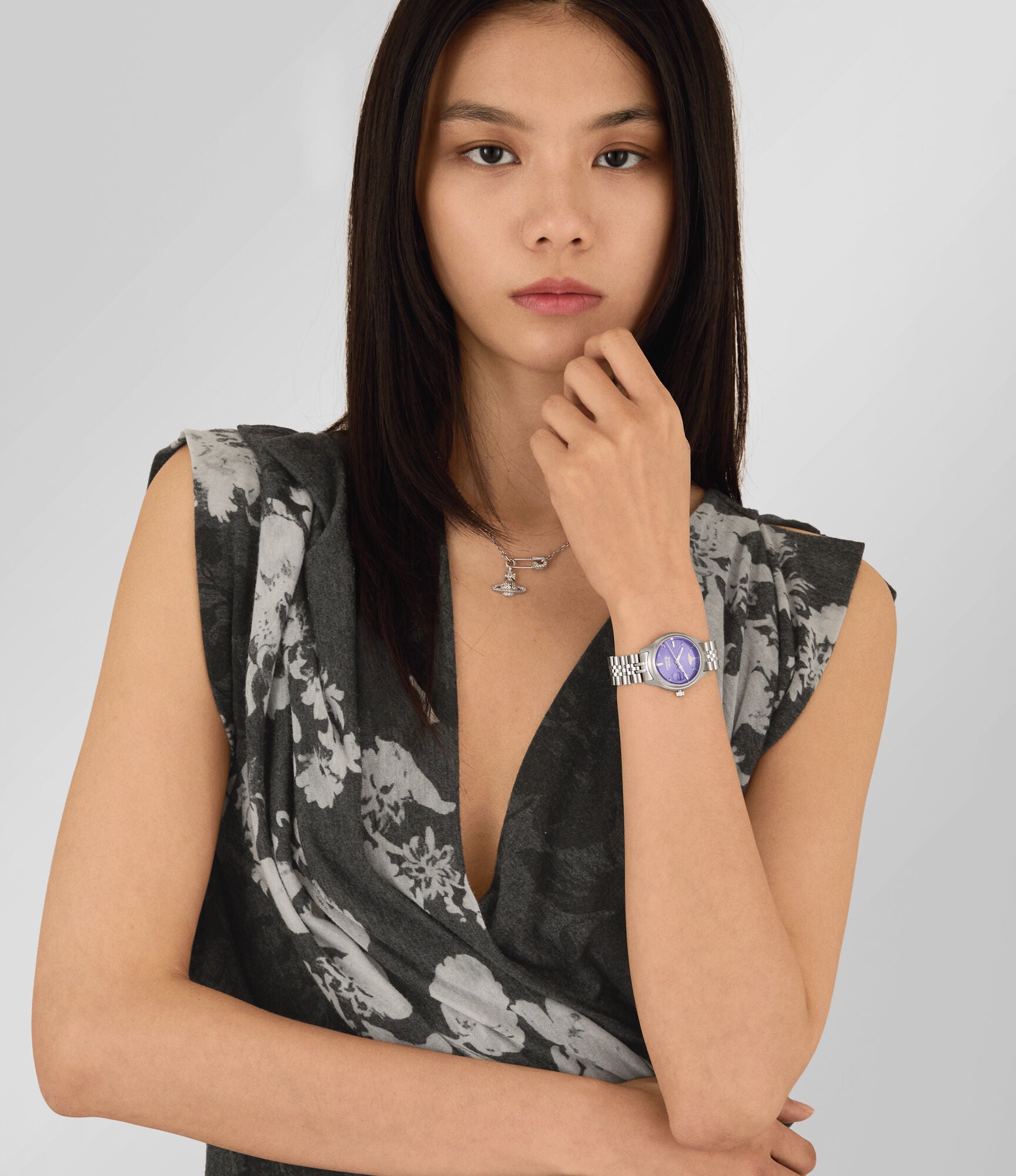 Woman wearing Vivienne Westwood Little Camberwell watch with purple dial on wrist
