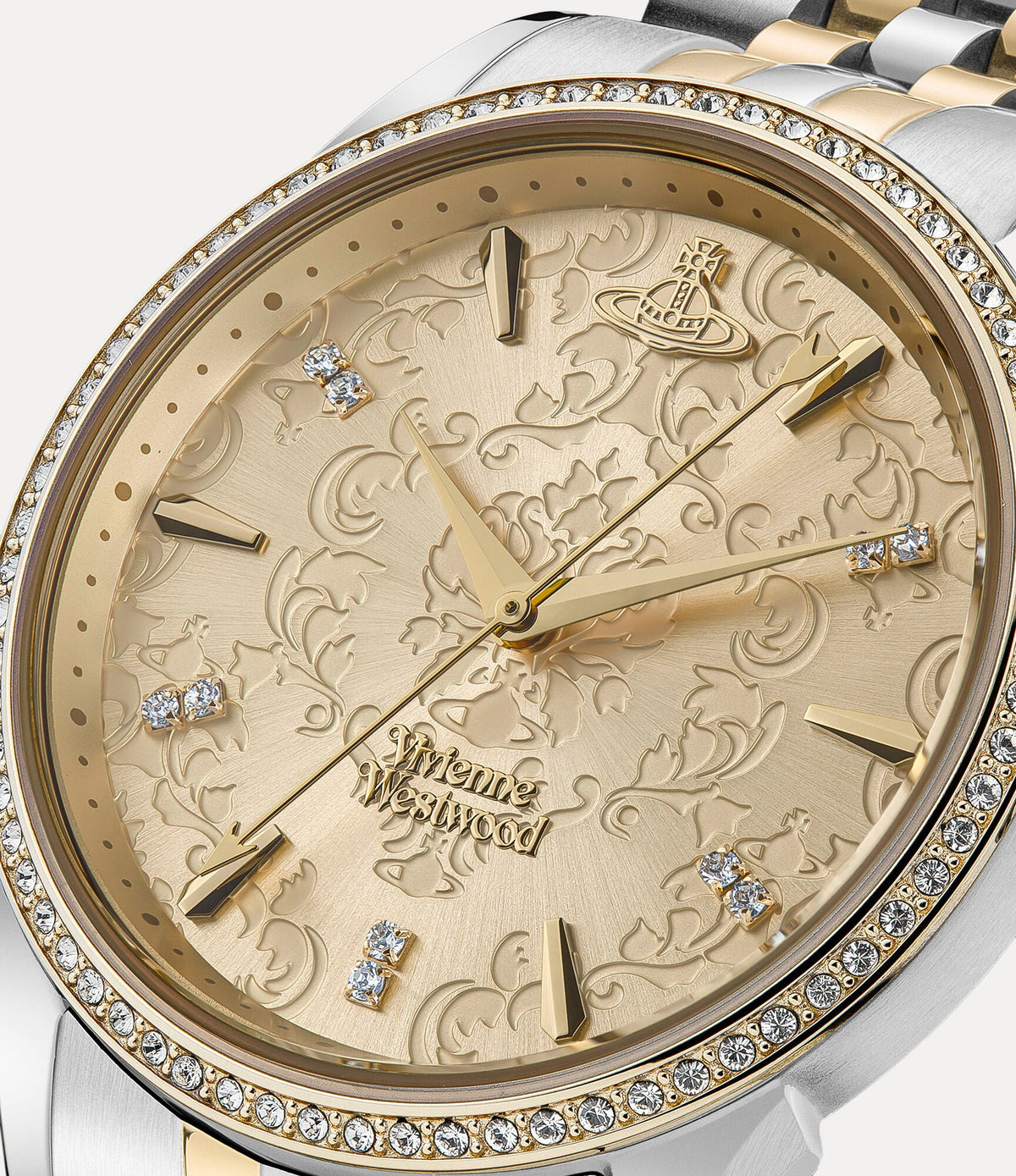 Vivienne Westwood VV208CPSG dial detail showing champagne face with crystal hour markers