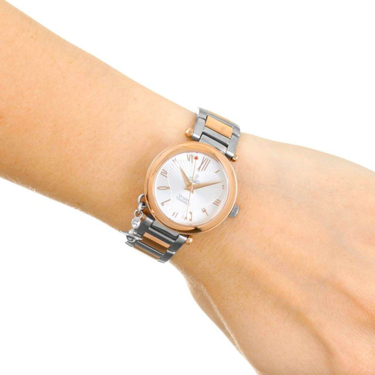 Vivienne Westwood Orb watch on wrist showing silver dial and two-tone bracelet