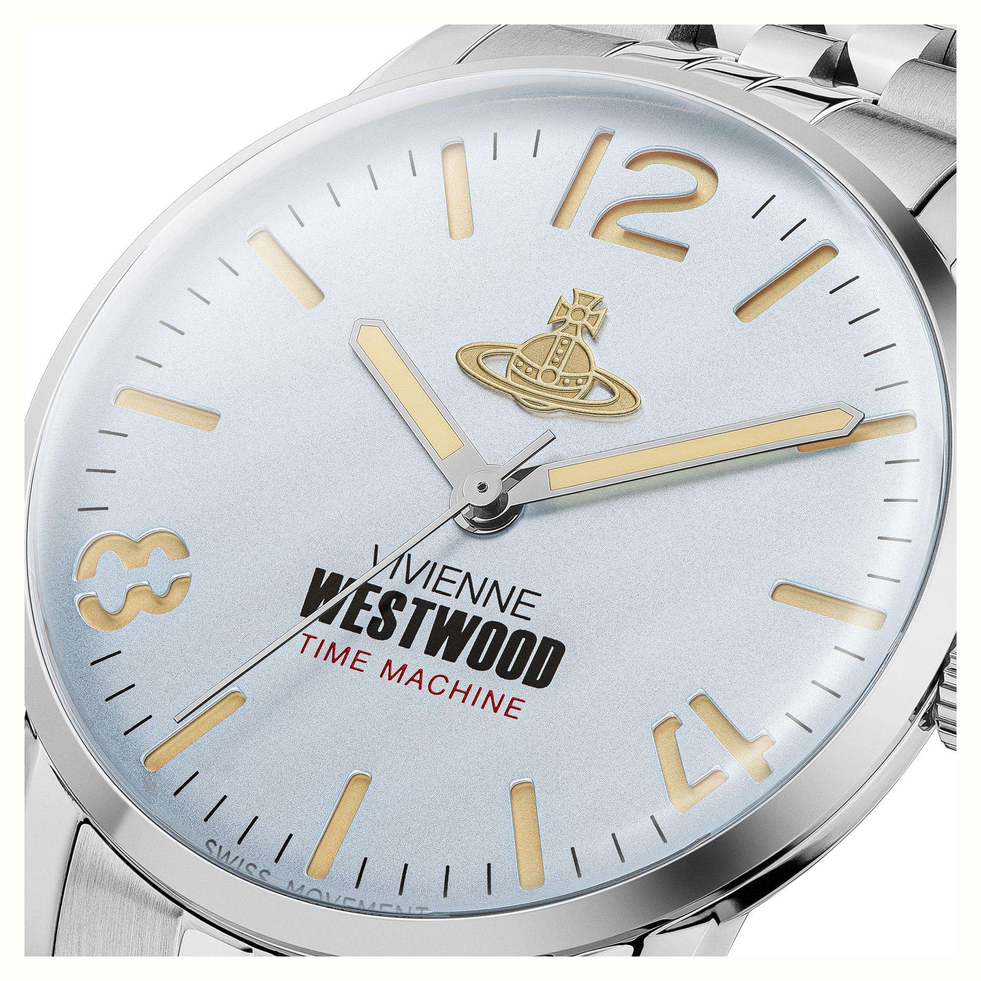 Close-up of light blue dial with gold numerals and Vivienne Westwood orb logo